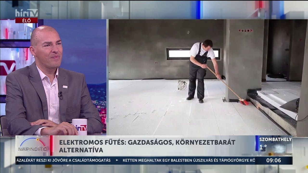 Tamás Tóth in the Hír TV studio, with a heating-film installation on the screen behind him: "Electric heating: an economical, environmentally friendly alternative"